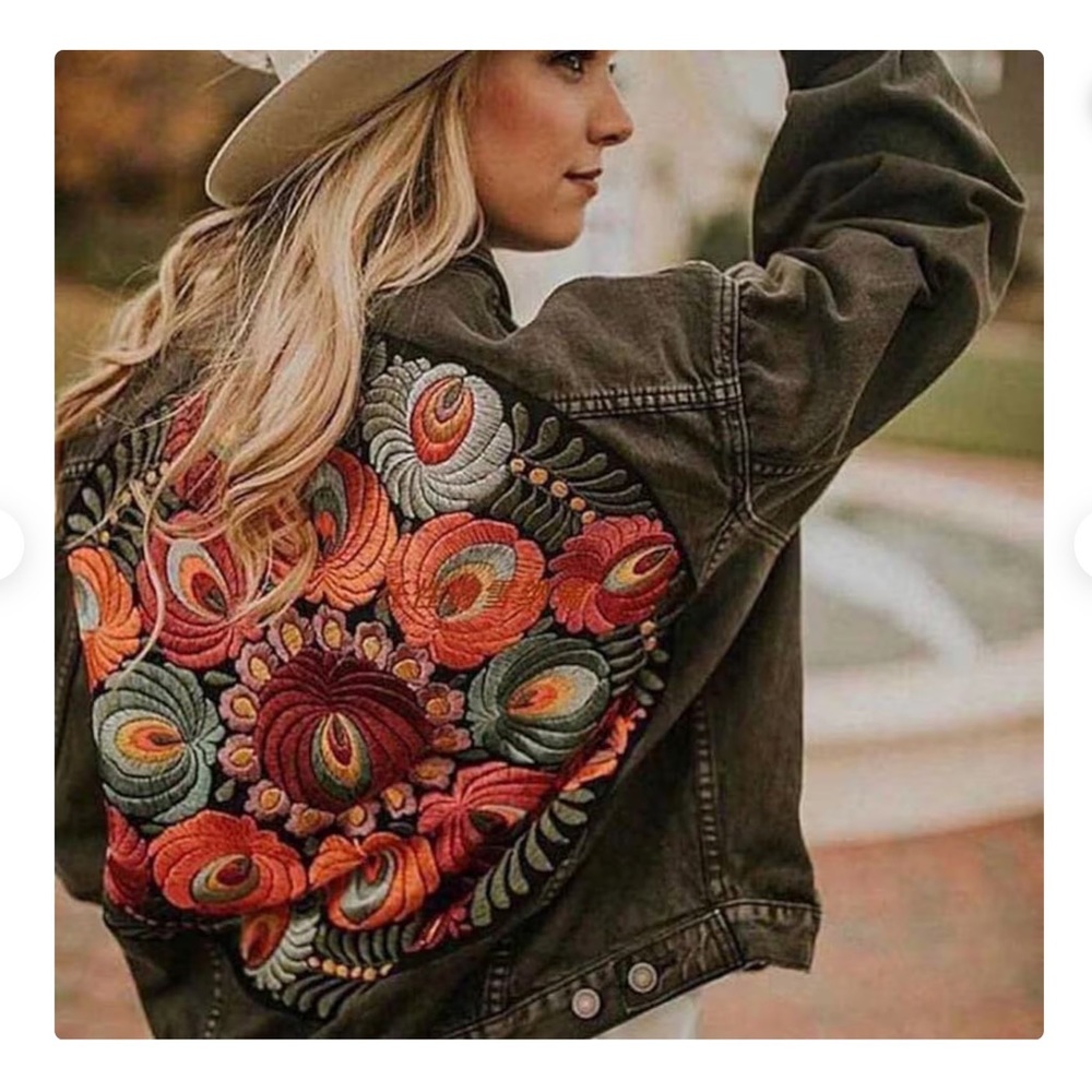 Distressed faded black floral embroidered denim jacket